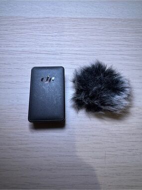 DJI Mic 1 transmitter and Gray Furry Wind Muff